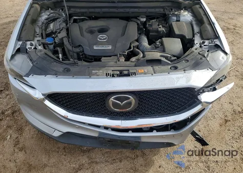 2019 Mazda Cx-5 Signature z USA, uszkodzony, nr VIN JM3KFBEY9K0593451